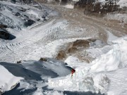 Pawel in the middle of down climbing the serac